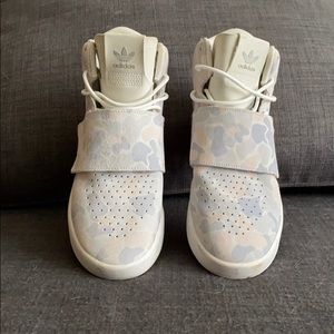 Adidas tubular camo high tops.